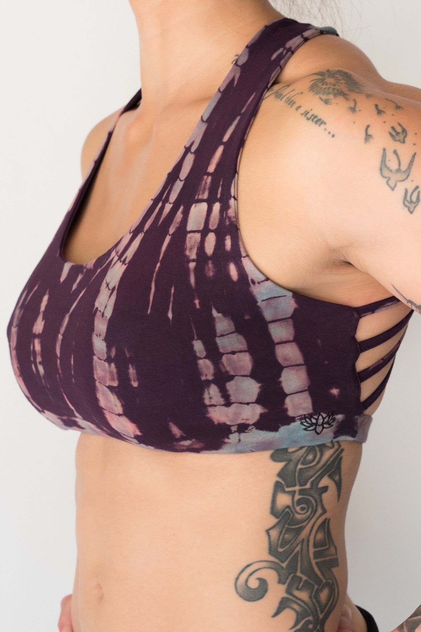 Amethyst Tie Dye purple with lavender highlights sports bra with full support with 4 criss cross straps on back.