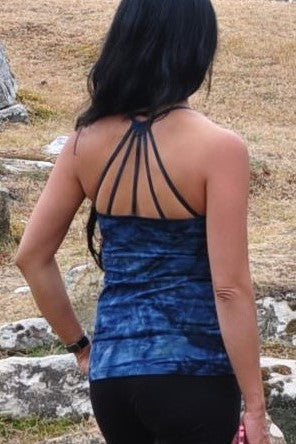 Back view of our Blue Dream Tie Dye Shanti Tank Top by Lotus Tribe Clothing with built in bra and stunning back strap design. Cute enough for everyday wear, but functional enough for yoga class or the gym. Super soft, high quality, 90% cotton knit with 10% spandex for just enough stretch.