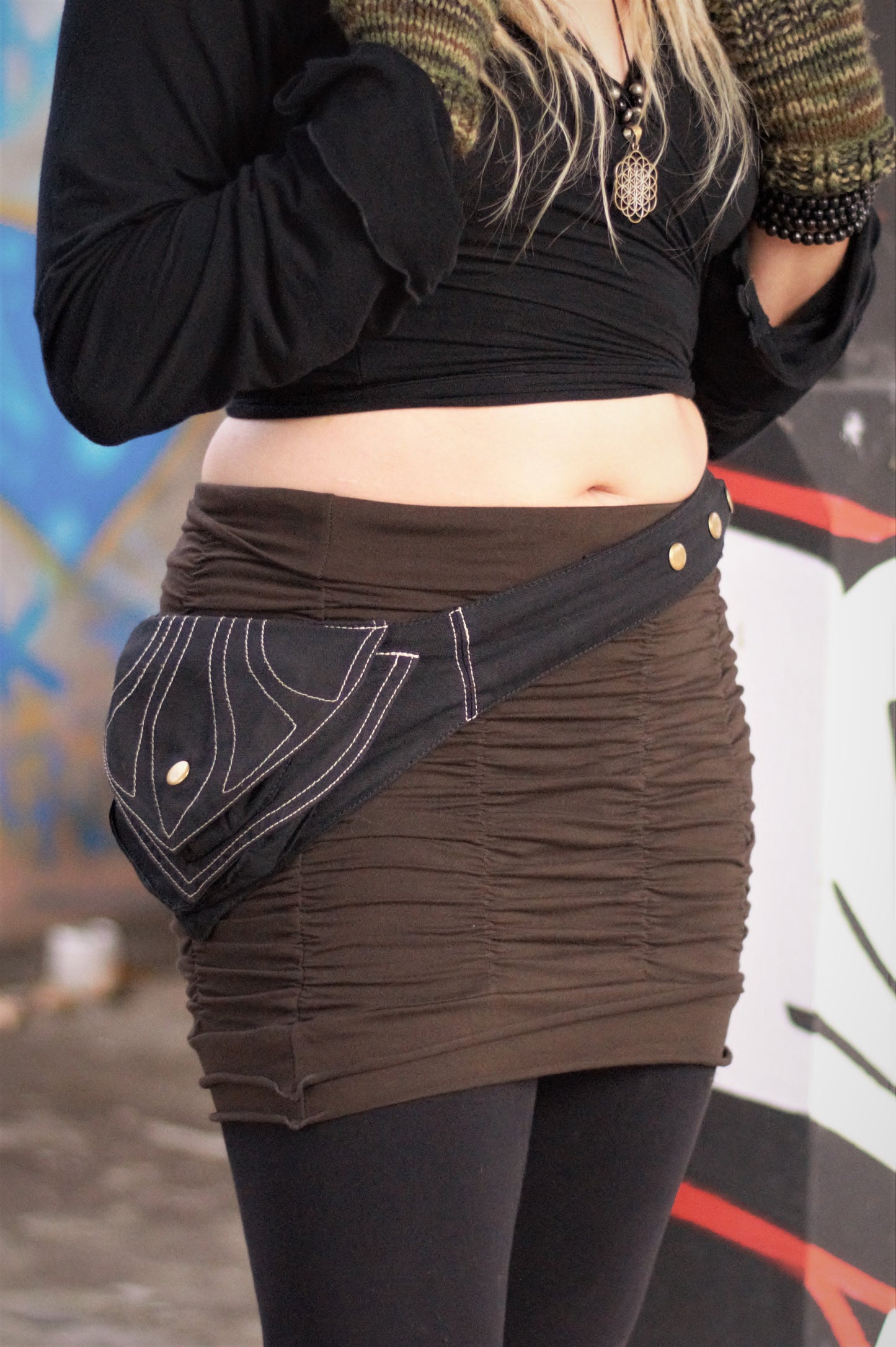 Stretchy, flattering & comfortable brown mini skirt with ruffled scrunchy look. Form fits to any body shape, great for the curvy girls! 90% cotton 10% spandex