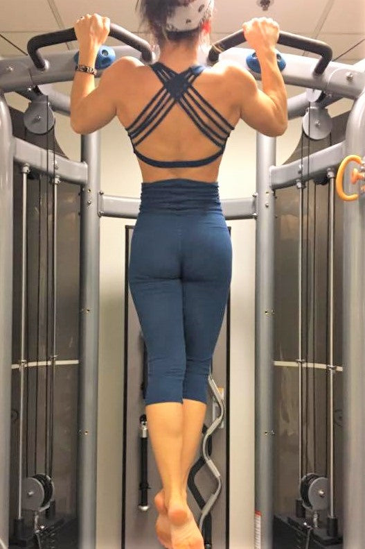 Solid colored cobalt blue 3/4 length Yoga Pants have a fold over waist that is adjustable to fit a longer torso or be worn lower on the hips. Soft 90% cotton and 10% spandex pictured with matching Cobalt Baru Sportsbra