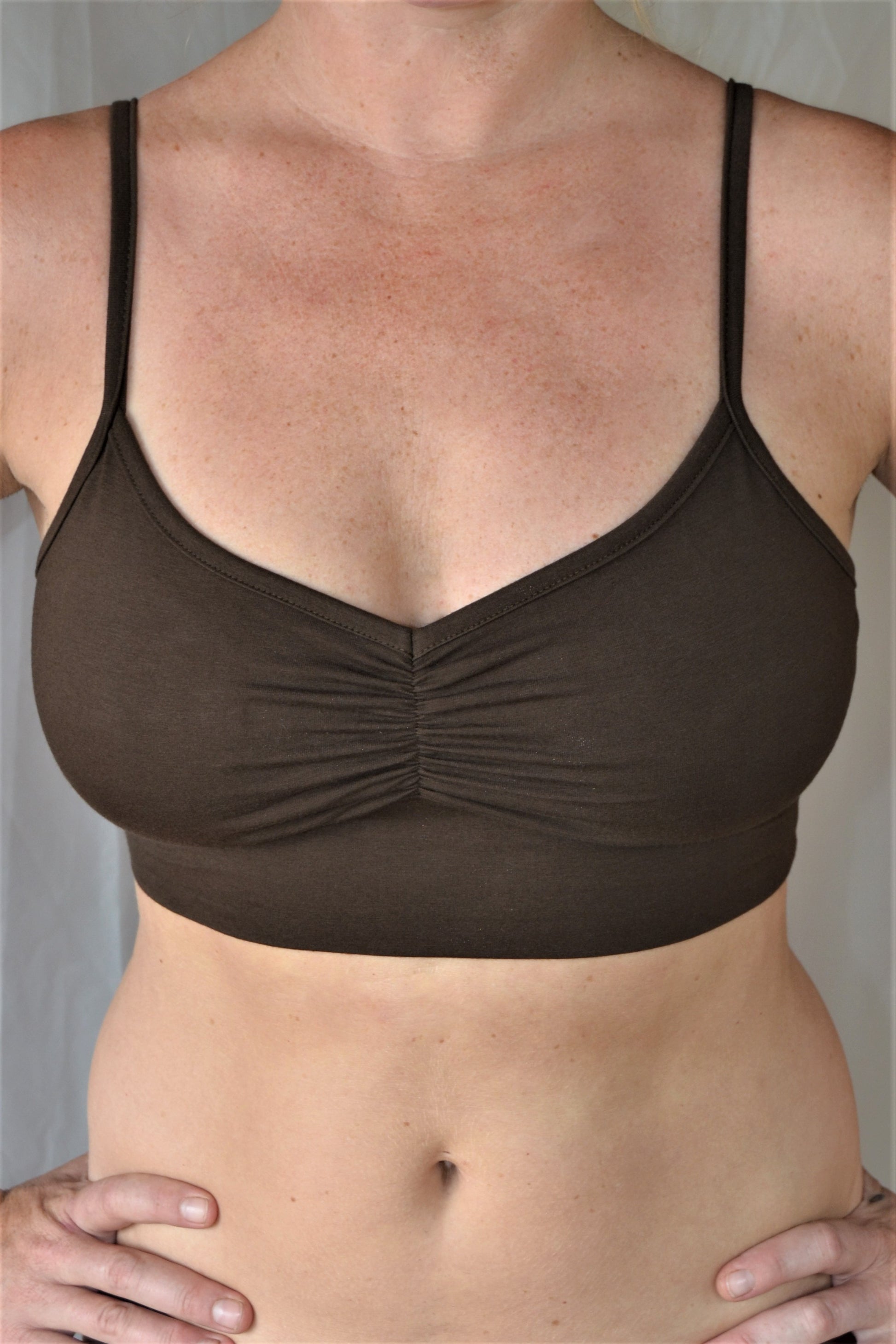 You'll be blissed out in this flattering Chocolate (brown) bra with adjustable spaghetti straps and scrunched center puckering it will soon become your new favorite!