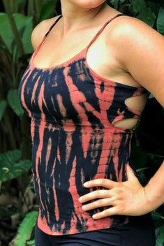 Fire tie dye tank top is black and orange streaks. Spaghetti straps, rounded bottom in front, lace up back. 90% cotton 10% spandex.