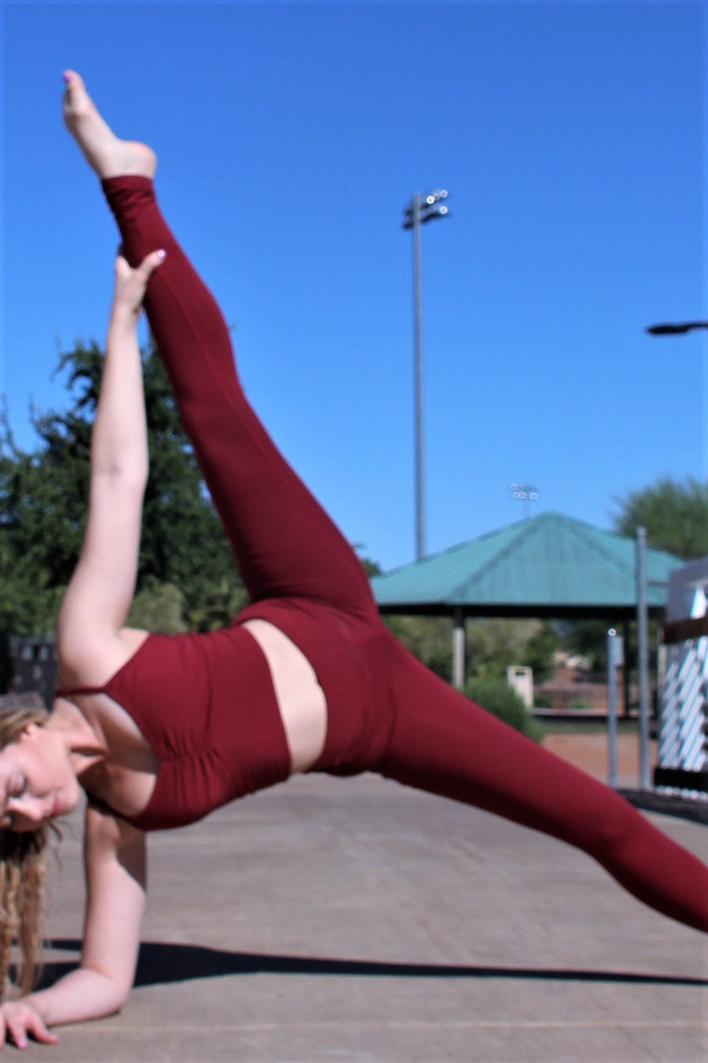 Yoga Pants in Garnet shown with matching Blissed Out Crop. Color is more burgundy wine, not maroon or red.