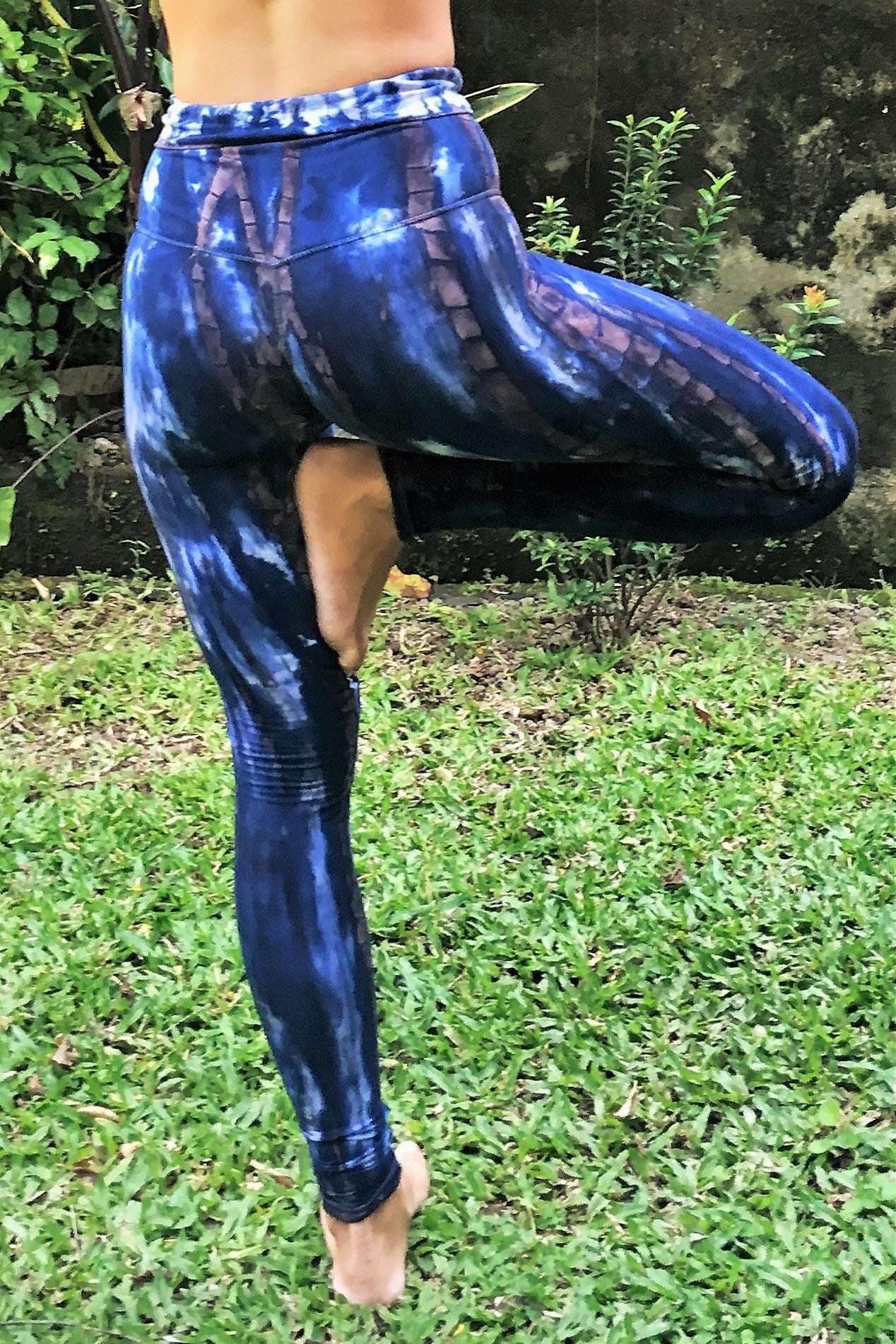 Comfortable, flattering high quality 90% Organic Cotton with 10% spandex knit into soft stretchy long length yoga pants with fold over top for adjustable fit can be worn with higher waist or lower on the hips. Gorgeous dark blue with brown streaks and possibly white highlights. Hand tied and dyed so each one is a unique work of wearable eco friendly art.