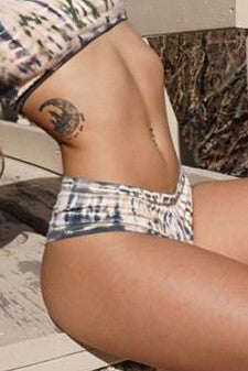 Front view of Jasper Tie Dye Cheeky Undies are green and grey highlights on peachy background. 90% cotton with 10% spandex