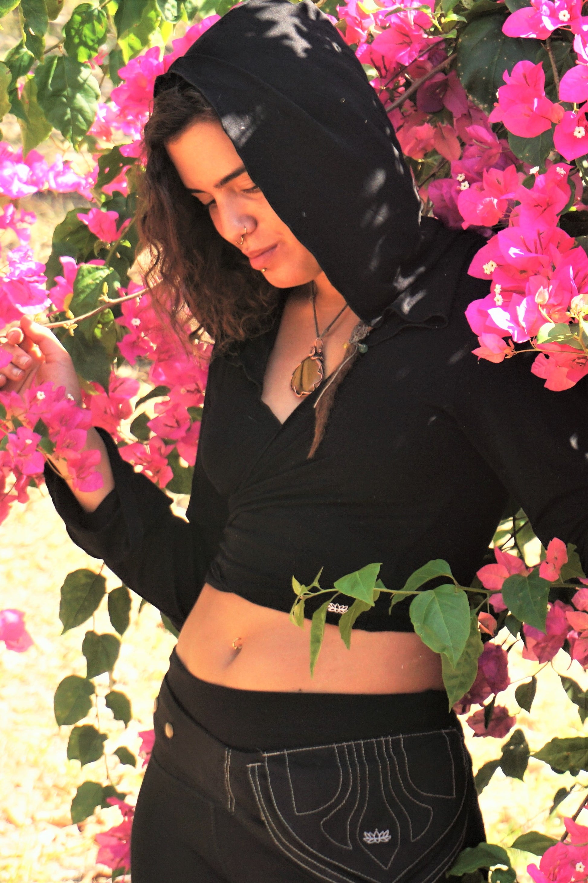 Hoody top that can be worn as a jacket or a shirt. Wraps around back for custom fit. Silky and stretchy yoga lifestyle wear.