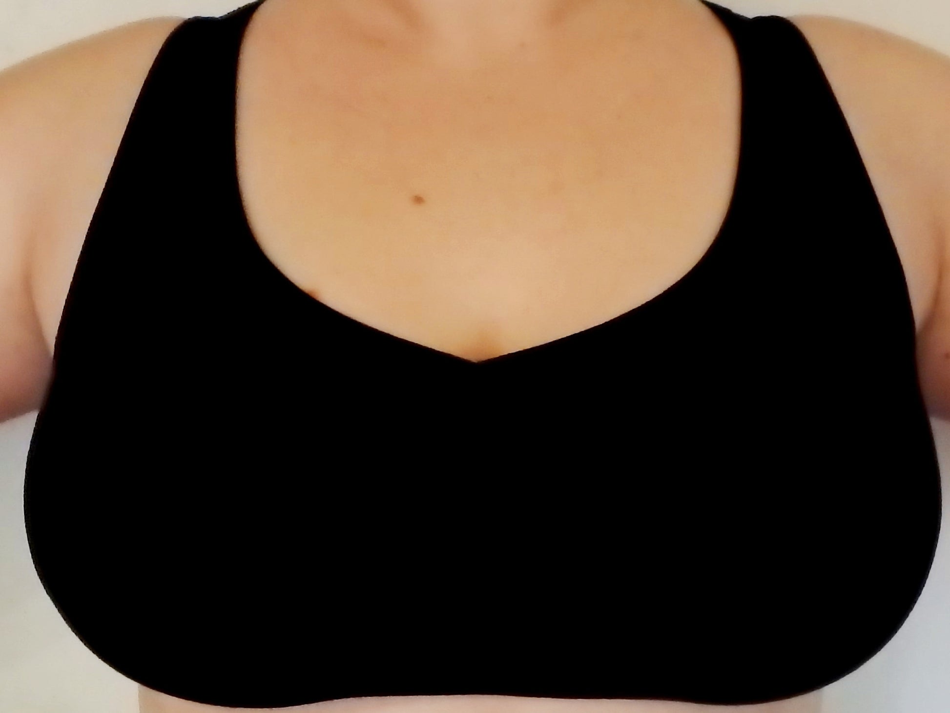 Onyx sports bra with heavy duty full coverage front for large breasted and fuller figured women. Has sunburst design in straps on back. Cute, comfortable and functional!