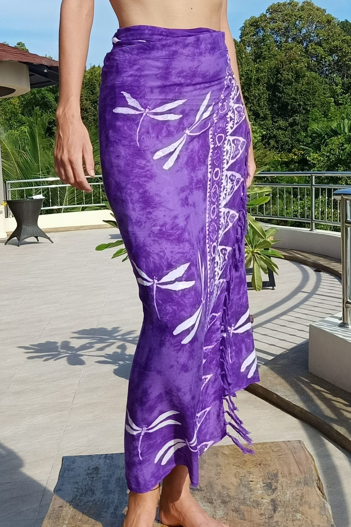 Purple sarong wrap around skirt with white batik dragonflies all over.