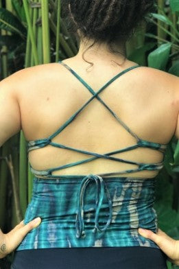 Back view of Rainforest Lace Up Tank shows criss cross straps and green tie dye with brown/beige streaks. Perfect for yoga, festivals, or summer.