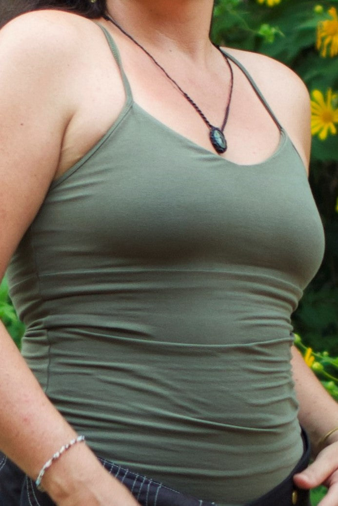 Sage Anand Tank stretchy breathable 90% cotton with 10% spandex. Form fitting, body hugging, built in bra.