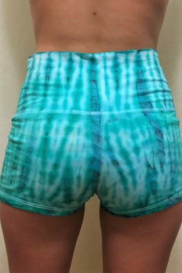 Beautiful aqua marine and turquoise with white highlights. Soft and comfortable tie dyed short shorts with fold over waist for adjustable custom fit, can be worn higher waisted, or low on the hips. Perfect for the gym, yoga, pole, etc.