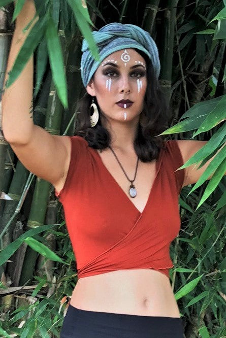 Rust Ninja Wrap worn as a top with front criss crossed around the body and tied in back. Rayon knit with spandex. Soft, silky and sexy.