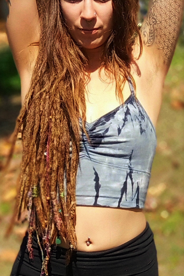 Sodalite tie dye is a steel blue with black streaks and white highlights on this Blissed Out Crop tank with spaghetti straps and scrunching between the breasts.
