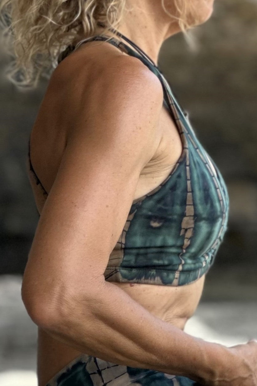 Side view of Shakti Bra shows full coverage of green tie dye sports bra. Natural, breathable cotton fabric with 10% spandex. 