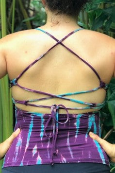 Back view of Amethyst tie dye Lace Up Tank shows criss cross straps on back and purple with blue tie dye by Lotus Tribe Clothing. 