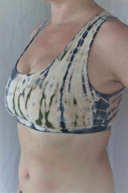 Soft, comfortable and super cute sports bra in peachy pink tie dye with green and grey highlights