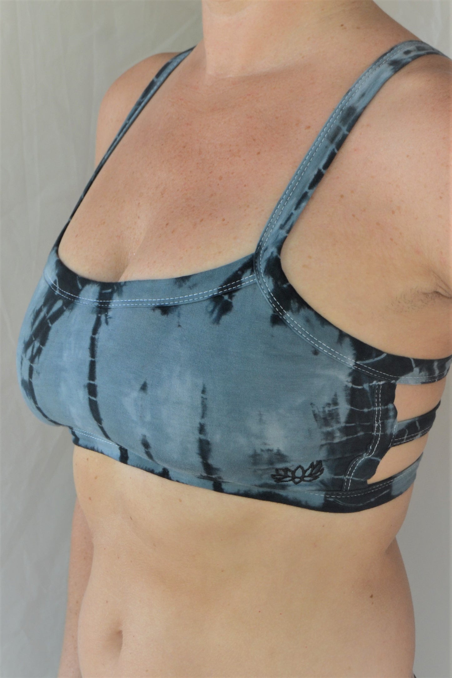 Steele blue with black tie dye sportsbra with three horizontal straps across the back. So comfortable with lighter support. Super soft 90% cotton 10% spandex 