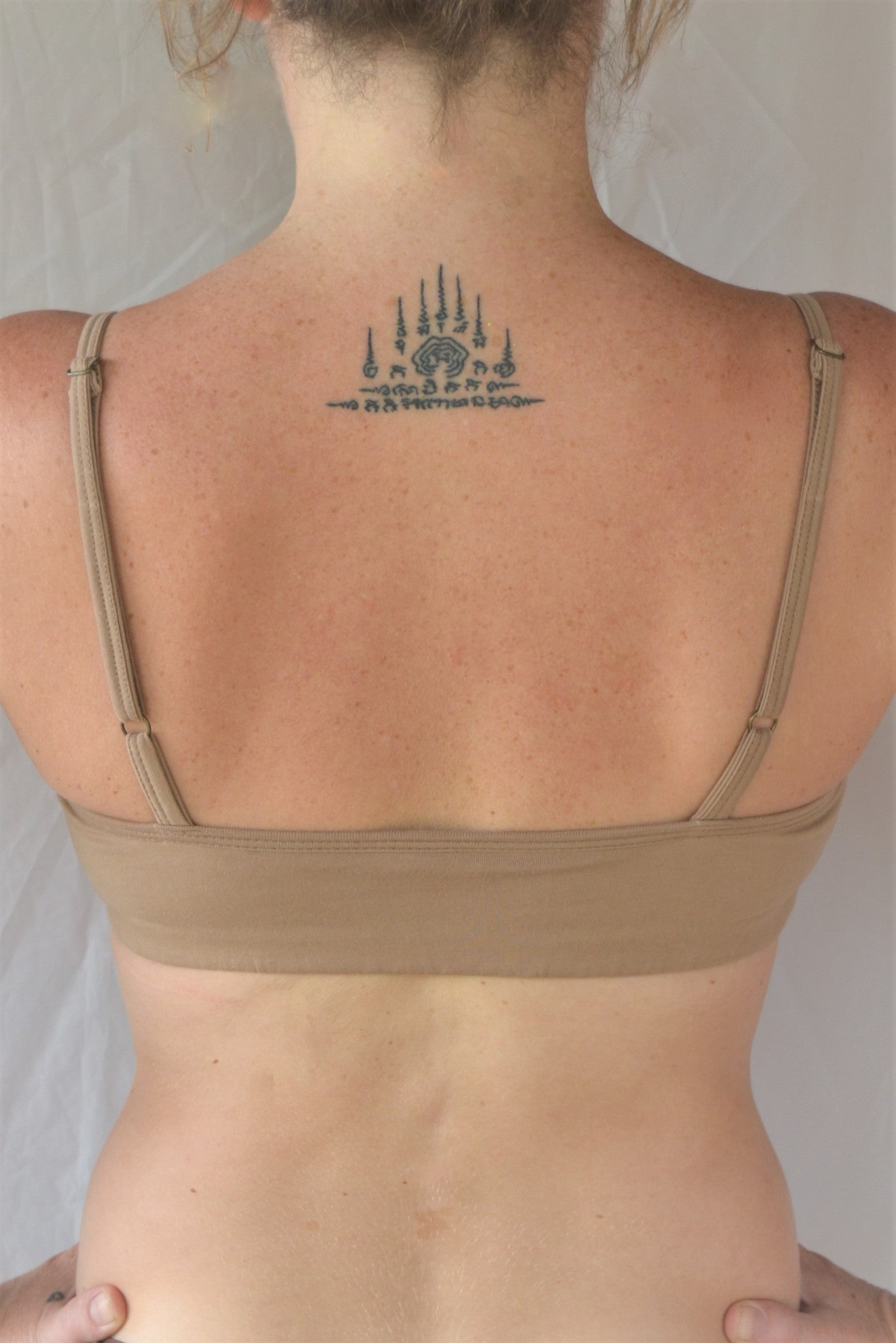 Enjoy a perfect state of zen in our basic, minimalist sportsbra. Solid beige. Medium support, great for an active lifestyle with adjustable spaghetti straps.