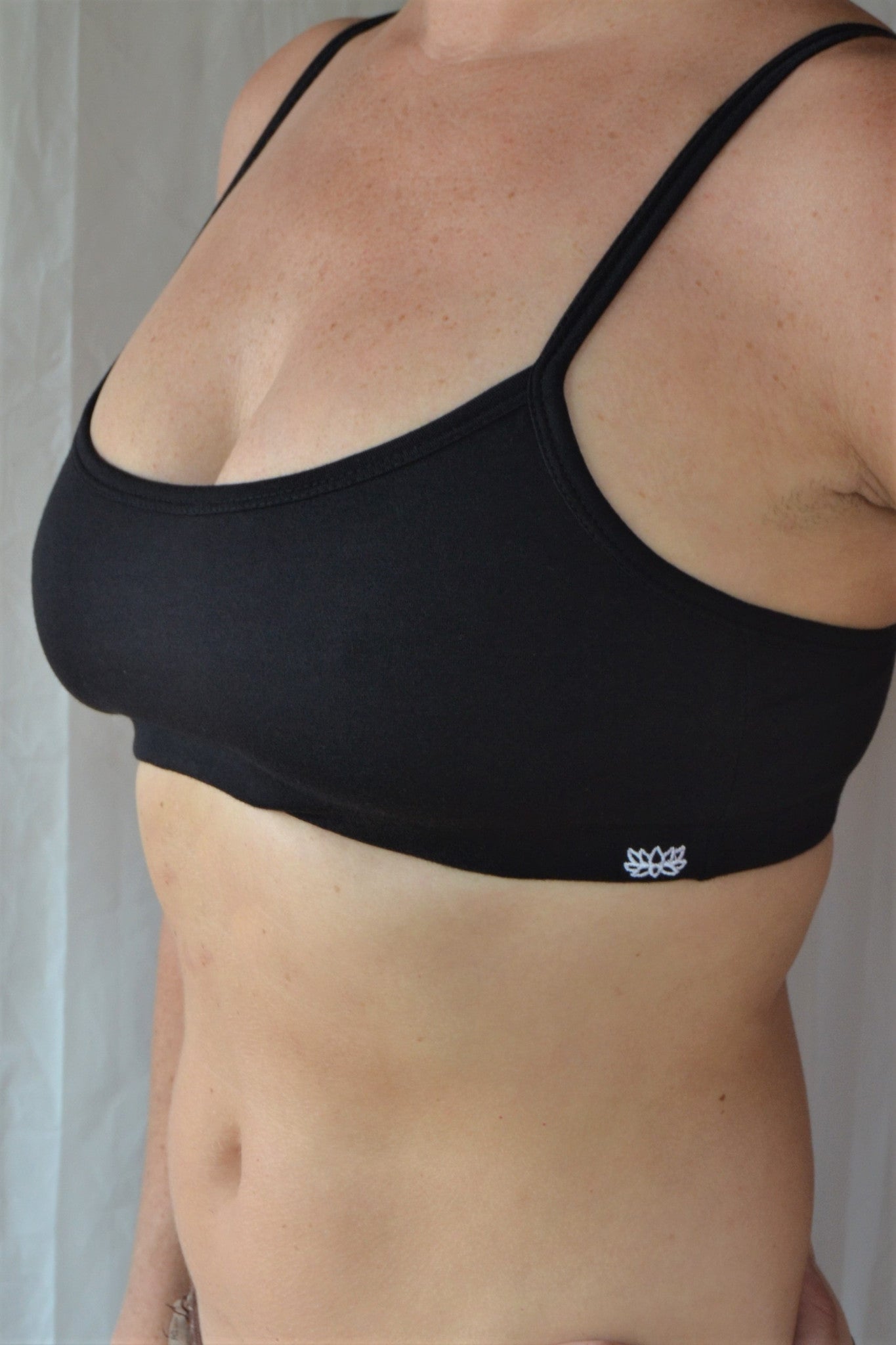 Enjoy a perfect state of zen in our basic, minimalist sportsbra. Solid black. Medium support, great for an active lifestyle with adjustable spaghetti straps.