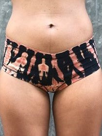 Natural fiber Cheeky Bottom undies made for a woman's body will show the bottoms of your cheeks. Black with burnt orange tie dye. 90% cotton 10% spandex.