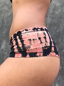 Natural fiber Cheeky Bottom undies made for a woman's body will show the bottoms of your cheeks. Black with burnt orange tie dye. 90% cotton 10% spandex.