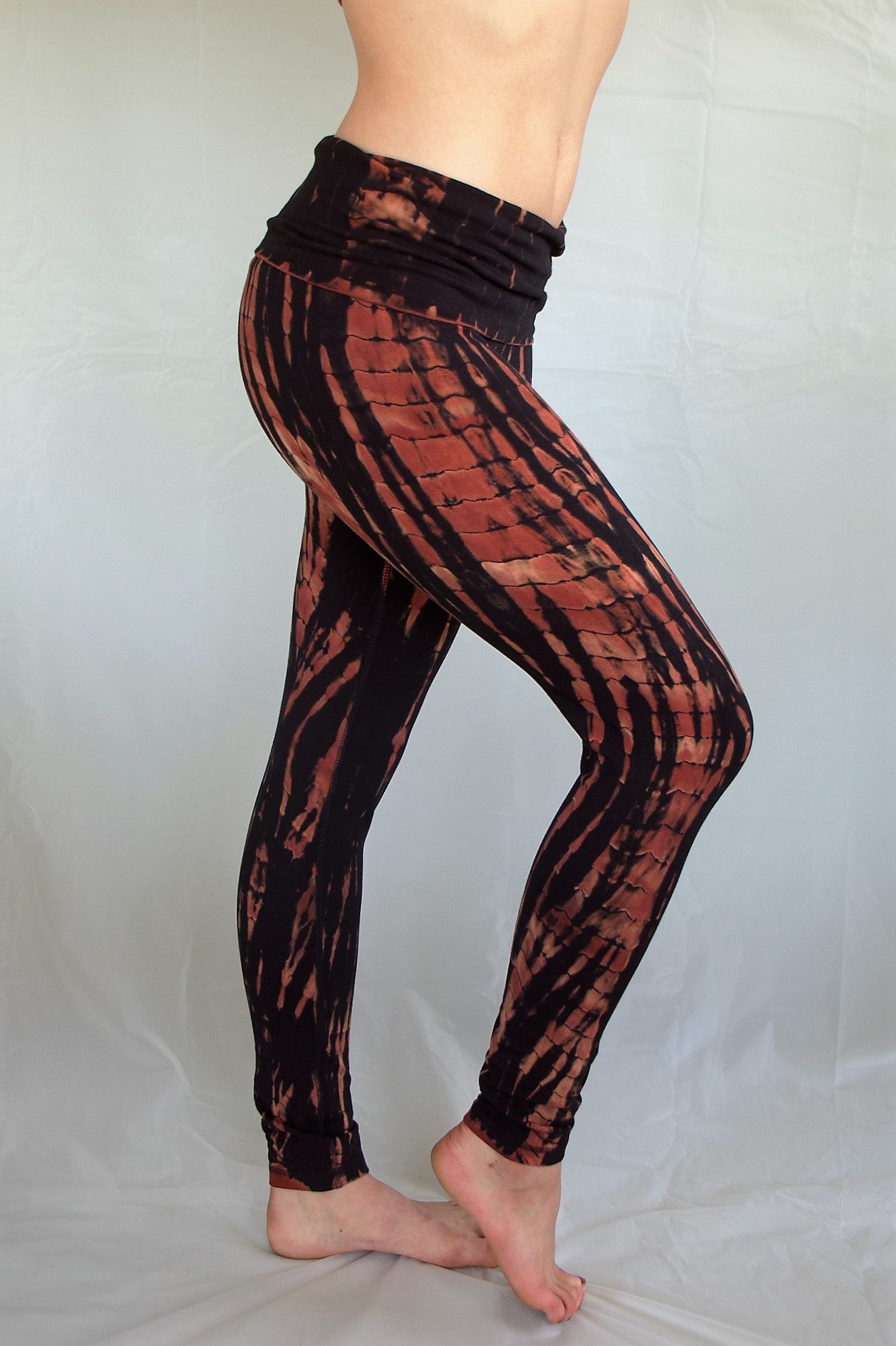 Fire tie dye, black with burnt orange highlights long length yoga pants with fold over top for adjustable fit can be worn with higher waist or lower on the hips. Soft, comfortable 90% cotton 10% spandex.