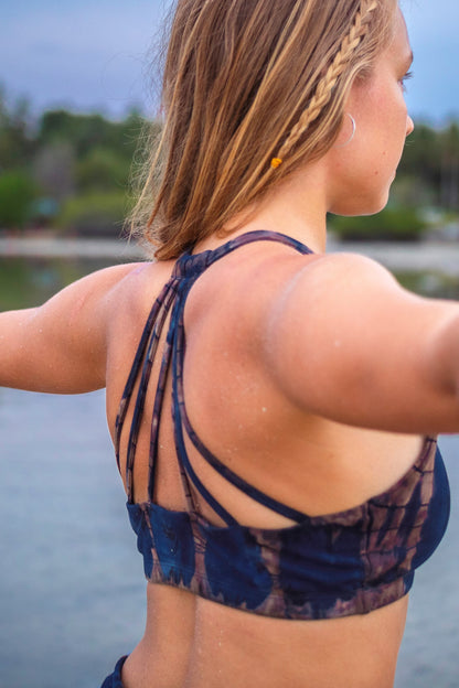 Gorgeous back strap pattern of Shakti Sportbra in Indigo Earth shown. Small lotus flower embroidery on back. Made for 90%  cotton with 10% spandex.