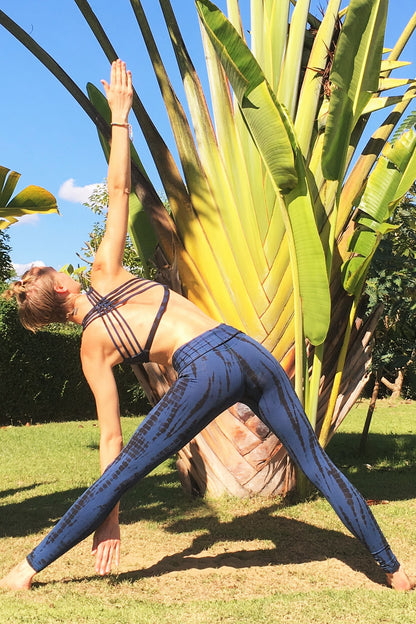 Midnight tie dye, blue with black long length yoga pants with fold over top for adjustable fit can be worn with higher waist or lower on the hips. Soft, comfortable 90% cotton 10% spandex shown with matching Baru Sportsbra.
