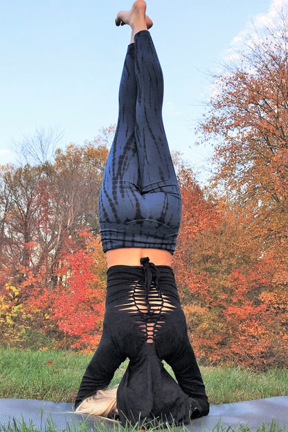 Midnight tie dye, blue with black long length yoga pants with fold over top for adjustable fit can be worn with higher waist or lower on the hips. Soft, comfortable 90% cotton 10% spandex shown with Long Sleeve Onyx Ninja Wrap.