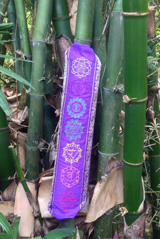 Yoga Mat Bag with Chakra embroidery in Purple has elephant trim in gold. Zip closure with adjustable length strap.