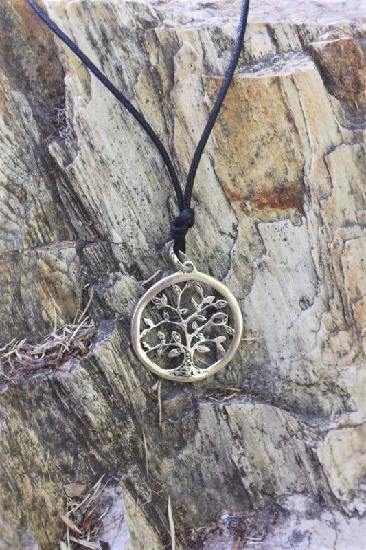 Silver Tree of Life pendant 1.5" diameter (3.5 cm) comes on black waxed cotton cord (vegan friendly).