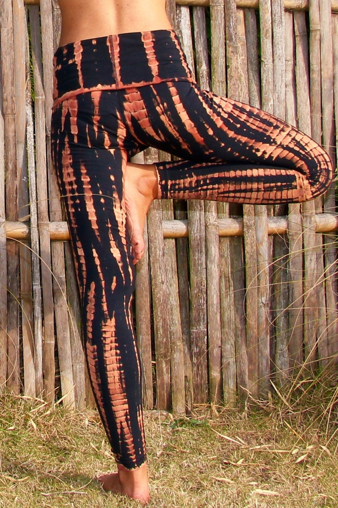 Fire tie dye, black with burnt orange highlights long length yoga pants with fold over top for adjustable fit can be worn with higher waist or lower on the hips. Soft, comfortable 90% cotton 10% spandex.